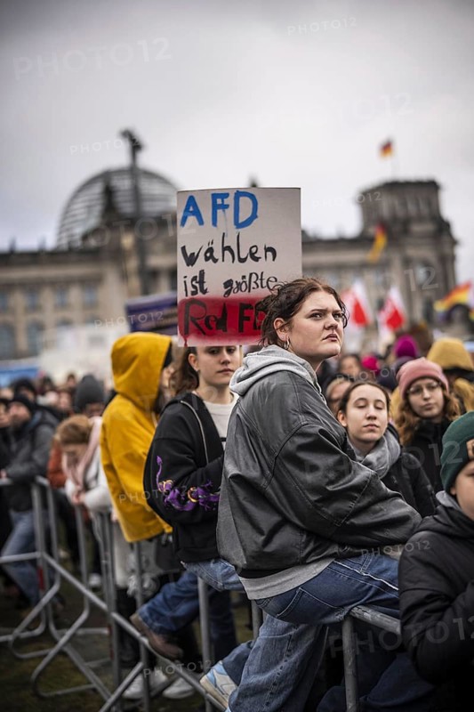 150, 000 people gather around the Bundestag in Berlin to build a human wall against the shift to the right in society. We are the firewall chanted demonstrators from a wide range of social groups. Recordings on 03.02.2024 in Berlin