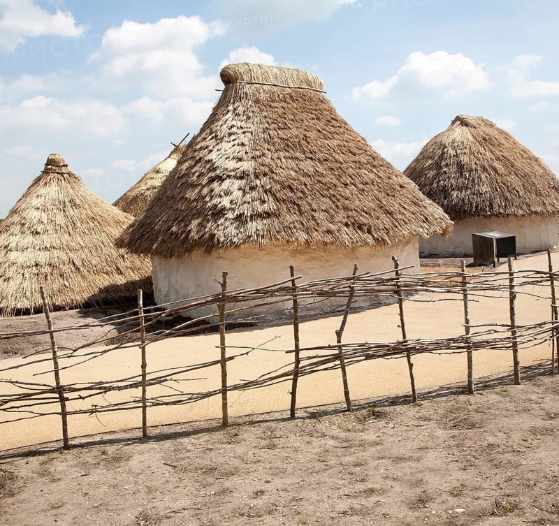Buildings of replica Neolithic huts at the Stonehenge site, Wiltshire, England, UK