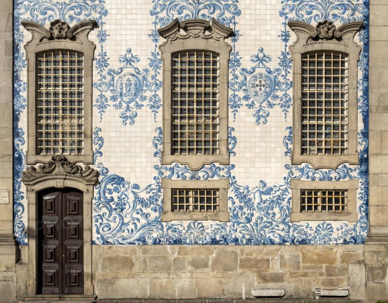 The facade of Igreja do Carmo church, adorned with intricate blue and white tiles, Porto, Portugal, Europe