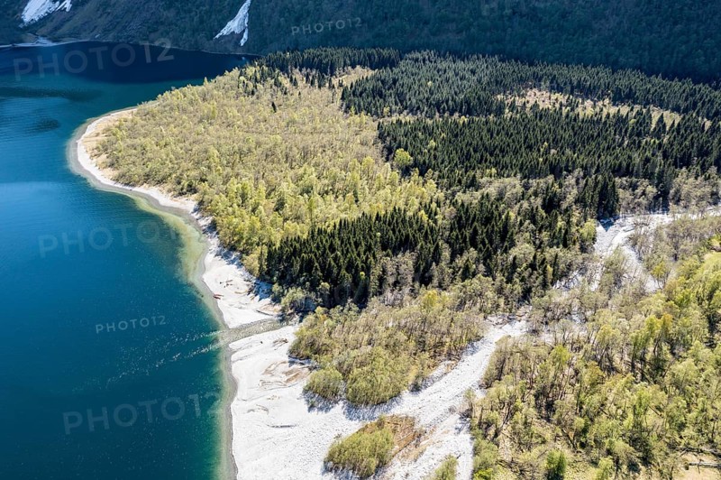 Aerial view of lake Lovatnet (or: Loenvatnet), sandy beach and birch forest, valley Lodalen south of village Loen, Norway, Europe