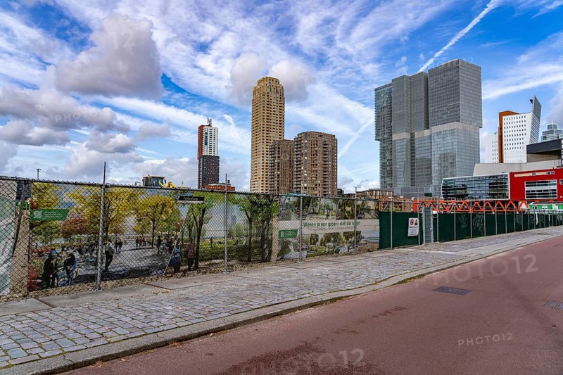 The Rijnhaven, a 28-hectare harbour basin, has now been filled in by almost a third to create space for up to 3, 000 flats, there will be an artificial beach, a floating park connected by jetties, restaurants and shops, cultural facilities, a major urban development project in the old harbour, the Rijnhaven borders on the popular Kop van Zuid and Katendrecht districts, Rotterdam, Netherlands