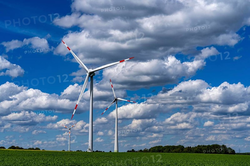 Wind farm, wind turbine, wind turbines from the manufacturer Enercon, blue sky with many white clouds, between Schermbeck and Dorsten, country road, Bestener Straße, North Rhine-Westphalia, Germany, Europe