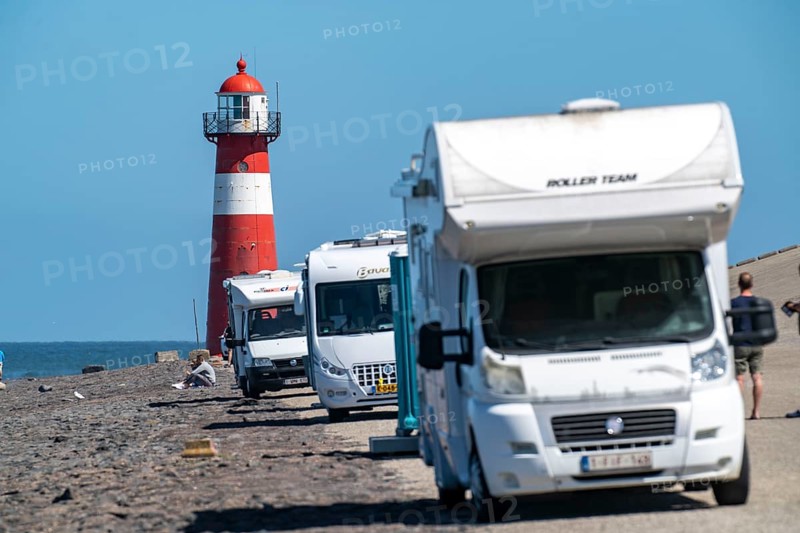 North Sea dyke near Westkapelle, Westkapelle Laag lighthouse, motorhome parking on the dyke, day caravan site, province of Zeeland, Walcheren peninsula, Netherlands
