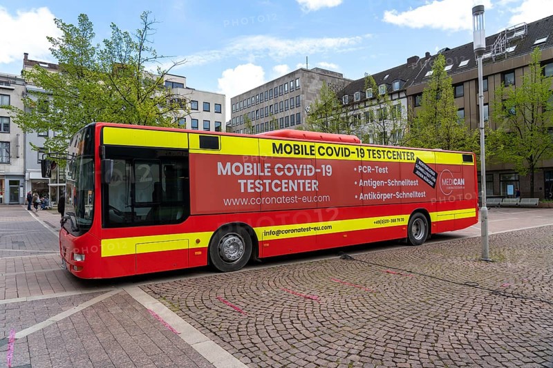 Mobile test centre for Corona rapid tests, in a bus, in the city centre of Bochum, North Rhine-Westphalia, Germany, Europe