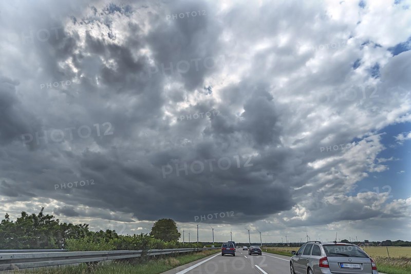 Wind turbines on the A 9 motorway, cloudy sky, Thuringia, Germany, Europe