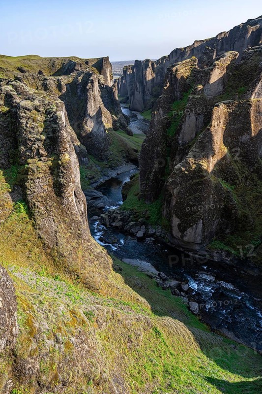 Fjaðrárgljúfur Canyon, Fjadrargljufur, rock formations in rugged deep canyon with river in the evening light, near Kirkjubæjarklaustur, South Iceland, Iceland, Europe