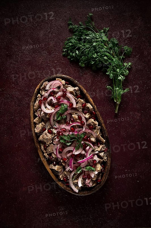 Kuchmachi, Traditional Georgian cuisine, chicken giblets appetizer, with spices and pomegranate seeds, on ketsi, no people, homemade