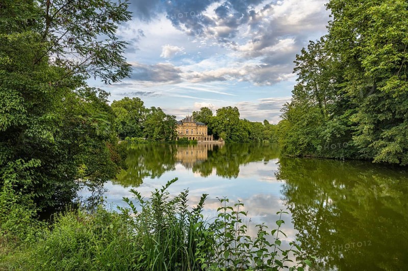 Monrepos Lake Castle reflected in Lake Eglosheim, Ludwigsburg, Baden-Württemberg, Germany, Europe