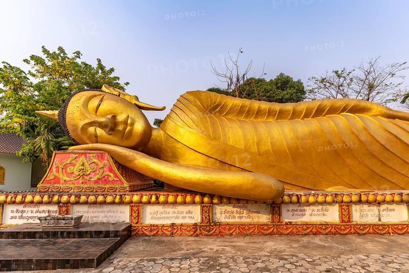 Giant reclining Buddha at Wat That Khao temple in the capital Vientiane, Laos, Asia