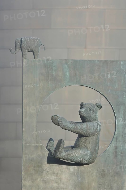 Two grey sculptures with bear figure and elephant figure, Steiff animals, teddy bear, bronze sculpture, grey, monochrome, Steiff, Margarete-Steiff-Platz, Steiff Museum, Giengen an der Brenz, Swabian Alb, Baden-Württemberg, Germany, Europe