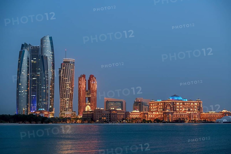 Skyline at dusk, Etihad Towers and Emirates Palace Hotel, Abu Dhabi, Emirate of Abu Dhabi, United Arab Emirates, Asia