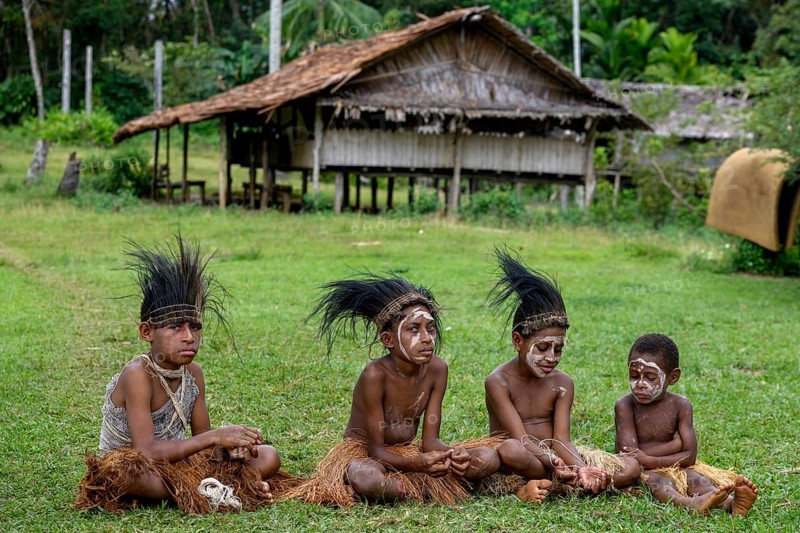 Children with headdress made of cassowary feathers, village Mutin, Lake Murray, Western Province, Papua New Guinea, Oceania
