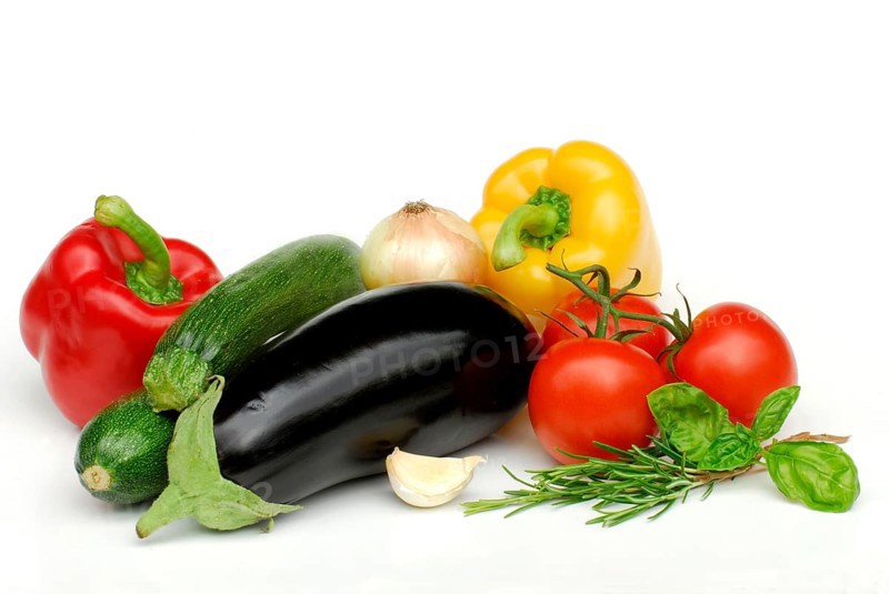 Ingredients for ratatouille, peppers, zucchini, aubergine, garlic, basil, tomatoes, rosemary, onion