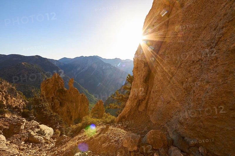Jagged rock, Rock face, Gingilos, Hike on the Gingilos, Morning light, Back light, Sun rays, Cloudless blue sky, Samaria Gorge, Omalos, Lefka Ori, White Mountains, West Crete, Island of Crete, Greece, Europe