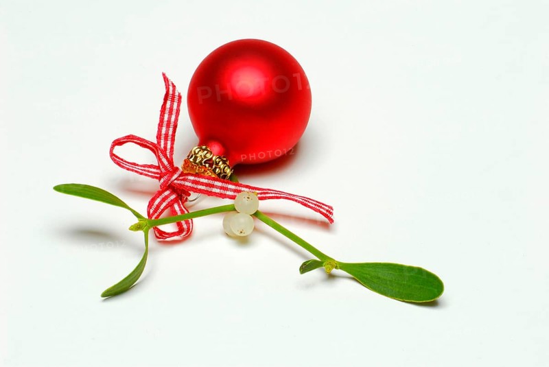 Red Christmas tree ball and mistletoe