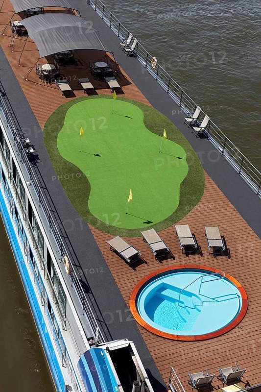 Artificial lawn with putting green, golf training on a river cruise ship on the Rhine, Düsseldorf, North Rhine-Westphalia, Germany, Europe