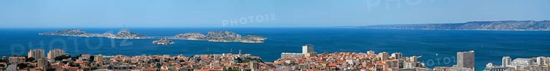 View of Marseille town and Chateau d'If castle famous historical fortress and prison on island in Marseille bay. Marseille, France, Europe
