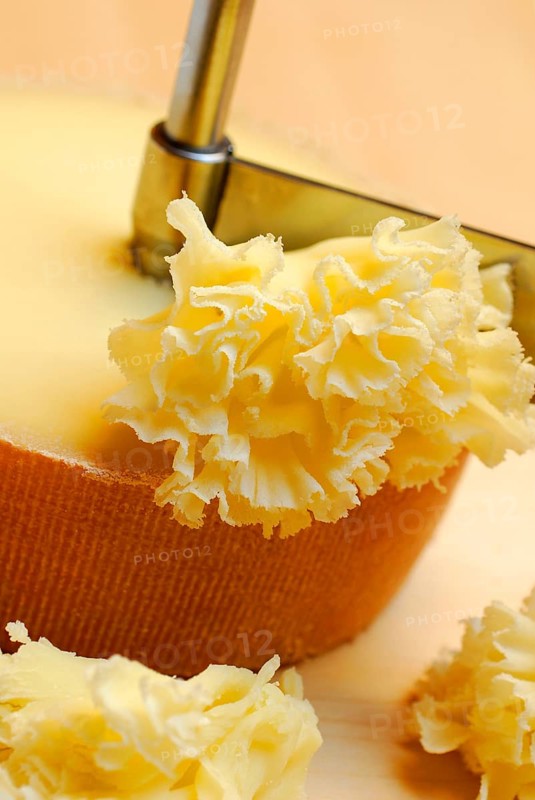 Cheese 'Tete de Moine' with rotating knife Girolle, cheese rosettes, monk's head