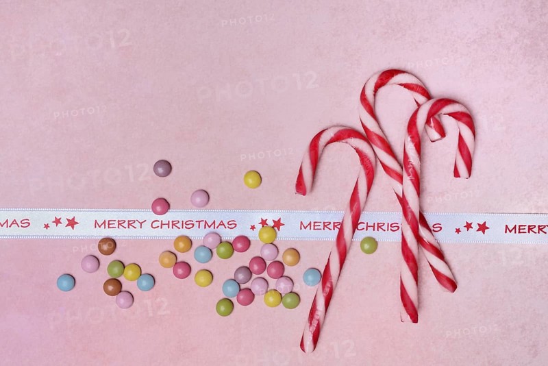 Candy canes and chocolate lentils, ribbon
