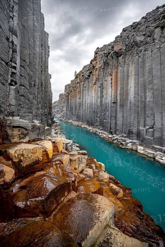 Stuðlagil Canyon, turquoise river between basalt columns, Egilsstadir, Iceland, Europe