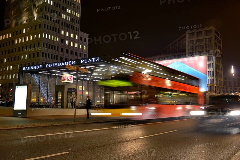 Double-decker bus at Potsdamer Platz square at night, Berlin, Germany, Europe
