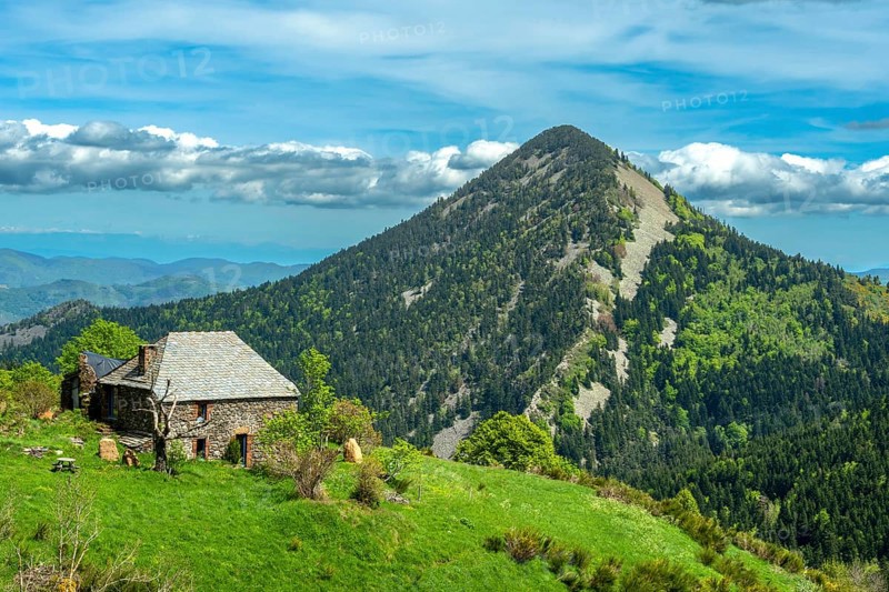 Scenic View of Dome-Shaped Volcanic Peaks (Sucs) in the Monts d'Ardeche Regional Natural Park. Auvergne-Rhone-Alpes. France
