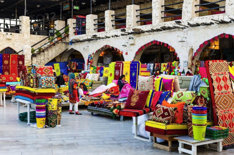 Marketplace with carpet sale in Souq Waqif in Doha, Muslim, Islam, Arabic, Orient, oriental, travel, culture, cultural history, history, old town, tourism, art, sale, shop, trade, bazaar, capital, Qatar, Asia
