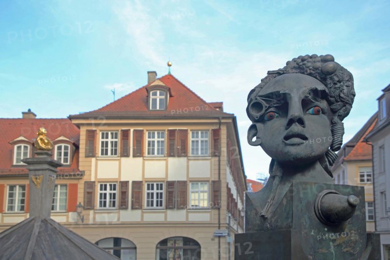 Sculpture Lech and Malsche by Jürgen Goertz, Malsche and Karl-Wilhelm-Friedrich-Fountain with memorial to Johann Sebastian Bach, female figure, head, face, bizarre, abstract, modern, whimsical, bronze, nose, hole, eyes, Johann-Sebastian-Bach-Platz, Ansbach, Middle Franconia, Franconia, Bavaria, Germany, Europe