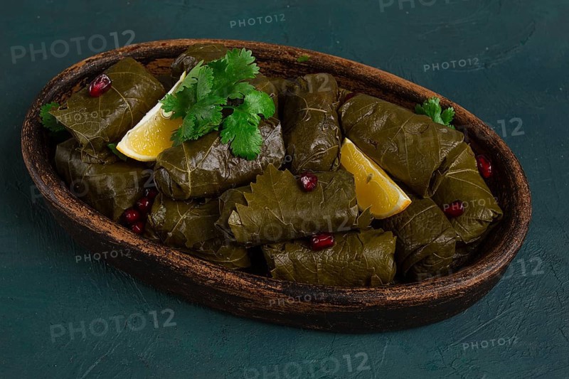 Dolma (Tolma) stuffed rolls, minced meat with rice, in grape leaves, top view, no people, close-up