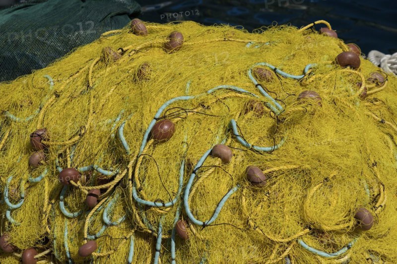 Yellow fishing nets with ropes and floats, harbour of Symi, Dodecanese, Greek Islands, Greece, Europe