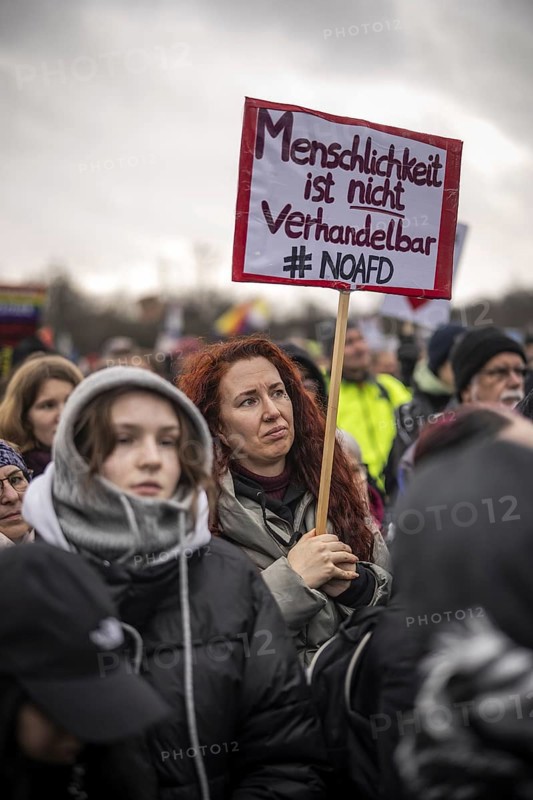 150, 000 people gather around the Bundestag in Berlin to build a human wall against the shift to the right in society. We are the firewall chanted demonstrators from a wide range of social groups. Recordings on 03.02.2024 in Berlin