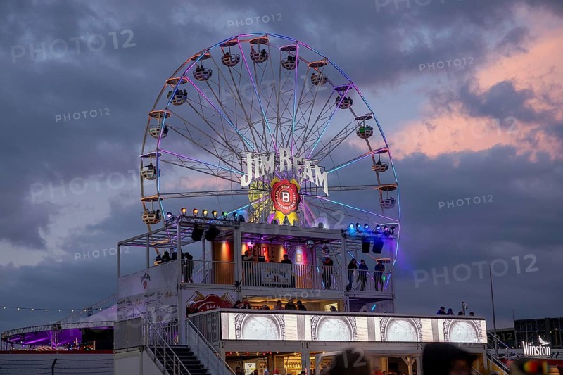 Adenau, Germany, 8 June 2024: Ferris wheel of the sponsor Jim Beam at the Rock am Ring Festival. The festival takes place at the Nürburgring race track near the town of Adenau from 7 to 9 June 2024, Europe