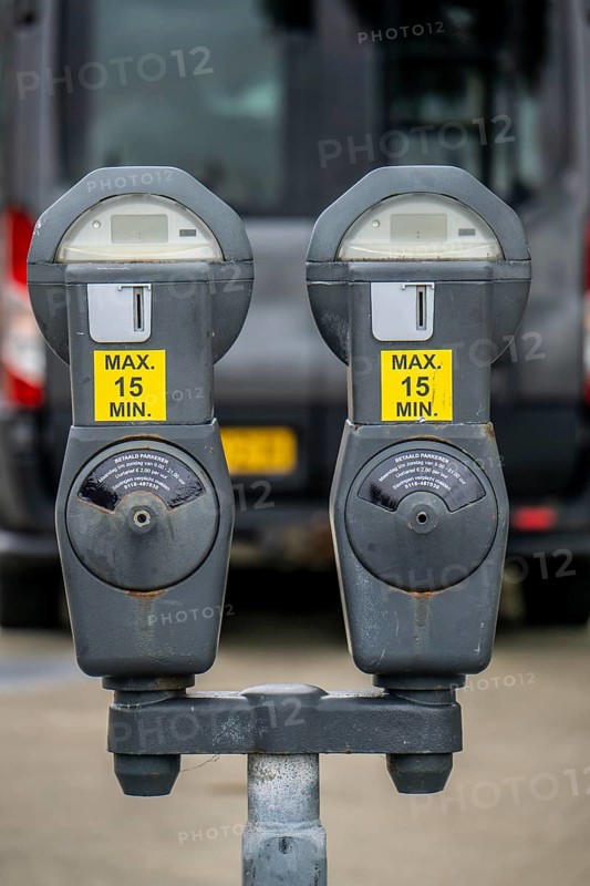 Parking meters, analogue, mechanical, still in operation, on Boulevard Ruyter, on the former casemates at the harbour entrance of Vlissingen, Zeeland, Netherlands