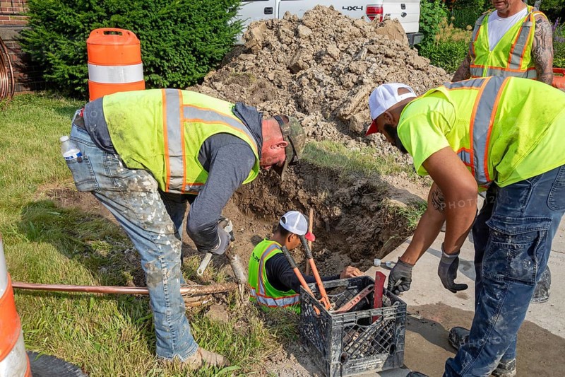 Detroit, Michigan, Workers replace old lead water service lines with copper pipes. Lead is harmful to health, especially in children. The city of Detroit estimates there are 80, 000 homes in the city with lead service lines and has begun a program to replace them all