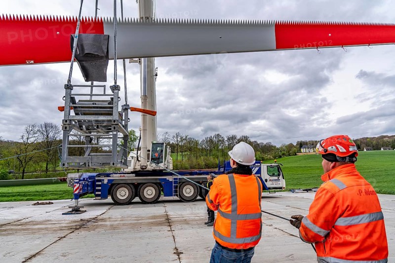 Preparation for the transport of a 68 metre long blade, a wind turbine, with a self-propelled Blade-Lifter vehicle, over a 40 km long route in the Bergisches Land, through towns, villages, over country roads, narrow through roads, to the construction site of the wind turbine near Hagen, North Rhine-Westphalia, Germany, Europe