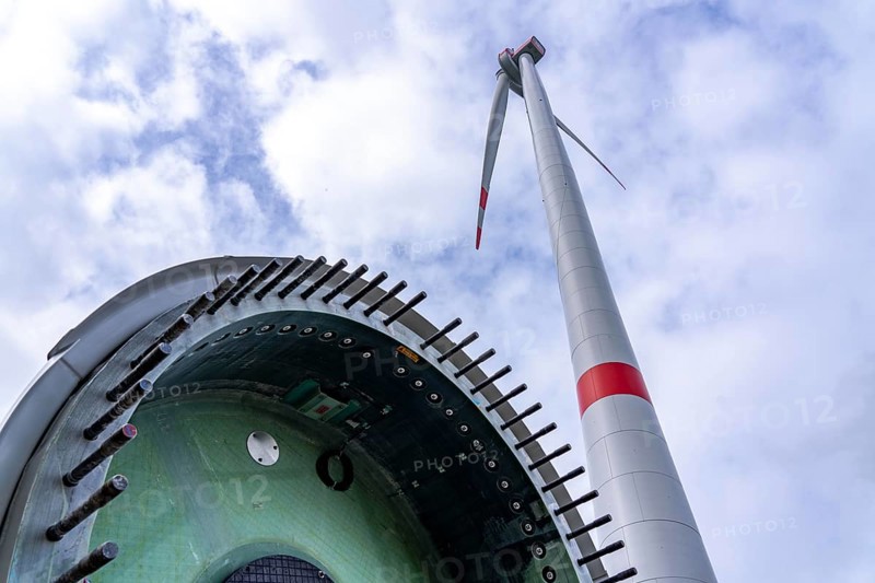 Erection of a wind turbine, wind energy plant, assembly of the third blade, with a crawler lattice crane, wind farm near Hagen, North Rhine-Westphalia, Germany, Europe
