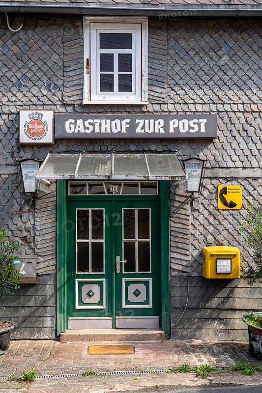 Gasthof zur Post, in the Sauerland, Arnsberg Forest, letterbox, postbox, public telephone, North Rhine-Westphalia, Germany, Europe