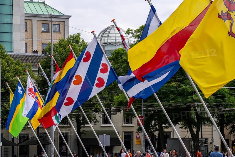 Flags, flags of the 12 different provinces of the Netherlands, at the historic Binnenhof, in the city centre of The Hague, Netherlands