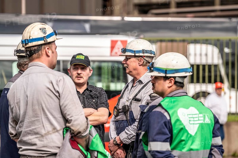 Steelworkers at a demonstration in front of the headquarters of ThyssenKrupp Steel Europe in Duisburg, against massive job cuts, after the participation of a foreign investor in the group, in the background the Oxygen steelworks, Duisburg North Rhine-Westphalia, Germany, Europe