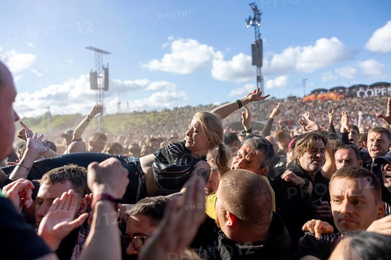 Copenhagen, Denmark - 19.6.2024: Festivalgoers crowdsurfing at the Copenhell Metal Festival at Kløverparken Camping Copenhagen, Denmark. The festival will take place from 19-22 June 2024