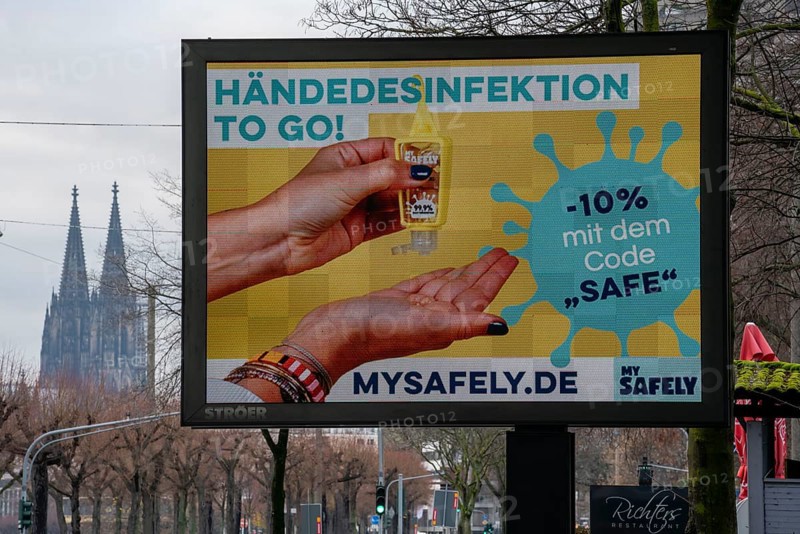 LED billboard, with digital advertising for hand sanitiser, on Konrad-Adenauer-Ufer in Cologne, North Rhine-Westphalia, Germany, Europe