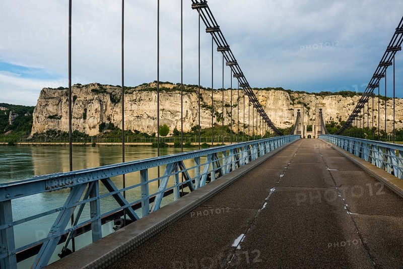 Old suspension bridge over the Rhone and rocks, Passerelle Marc Seguin, Tain-l'Hermitage, Département Ardèche, Auvergne-Rhône-Alpes, France, Europe