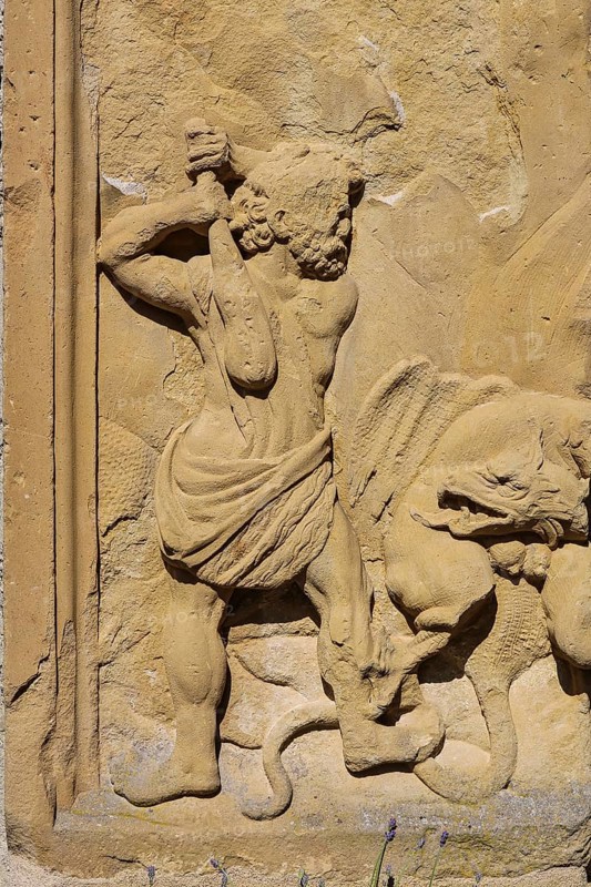 Stone relief, man with club, fighting, Lichtenstein Castle, fairytale castle of Württemberg, historicist building, landmark of the Swabian Alb, Honau, Lichtenstein, Reutlingen district, Baden-Württemberg, Germany, Europe