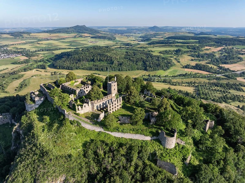 Aerial view of the volcanic cone Hohentwiel with Germany's largest fortress ruins, on the horizon the Hohenstoffeln and Hohenhewen, district of Constance, Baden-Württemberg, Germany, Europe
