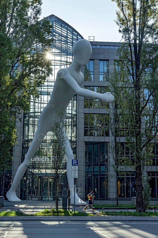 Walking Man, monumental sculpture by Jonathan Borofsky made of steel and plastic, pedestrian, walking man, human being, Munich RE insurance company, Munich Re, Leopoldstrasse, Schwabing, Munich, Upper Bavaria, Bavaria, Germany, Europe