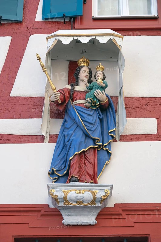 Figure of a saint on a house, Iphofen, Lower Franconia, Bavaria, Germany, Europe