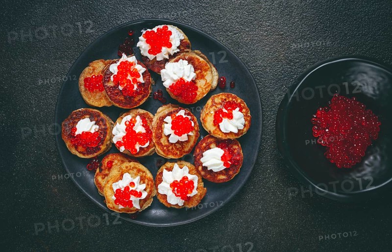 Demidoff pancakes, mini pancakes, with sour cream and red caviar, homemade, no people