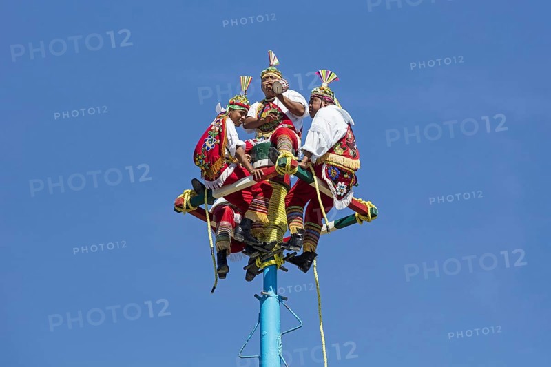 Danza de los Voladores, Dance of the Flyers, flying men of Papantla performing ancient Mesoamerican ritual in Tulum, Quintana Roo, Yucatán, Mexico, Central America
