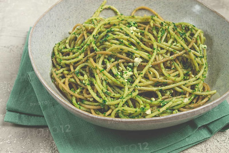 Spaghetti with pesto sauce, homemade, no people