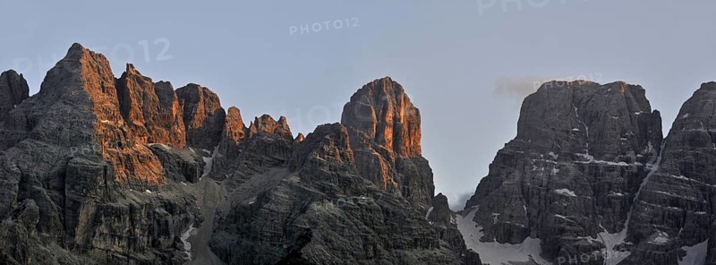 Alpenglow at sunset over the mountain Monte Cristallo in the Dolomites, Italy, Europe
